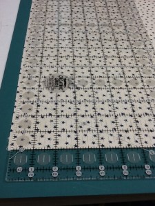 Align a ruler line along the fold!